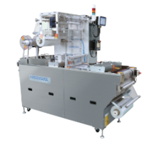 Vacuum thermoforming machine